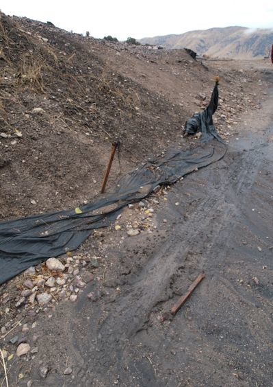 silt fence fallen over in the rain