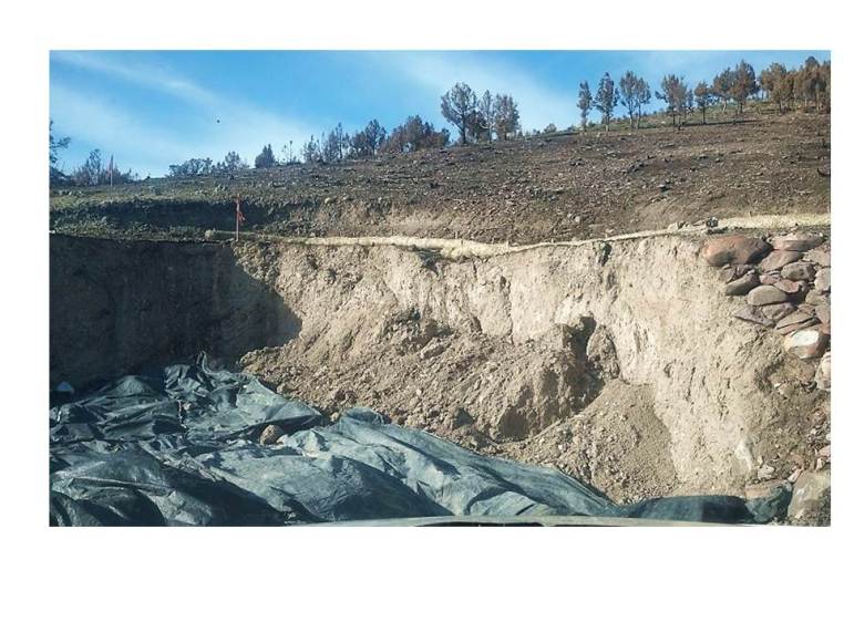 photo of an empty foundation hole with erosion