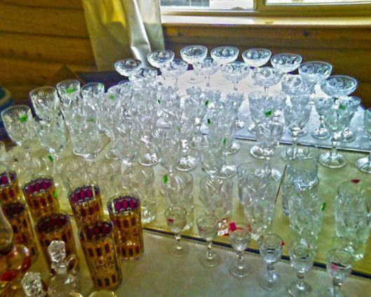 photo with a large number of cut glass pieces on it lined up as they are unpacked