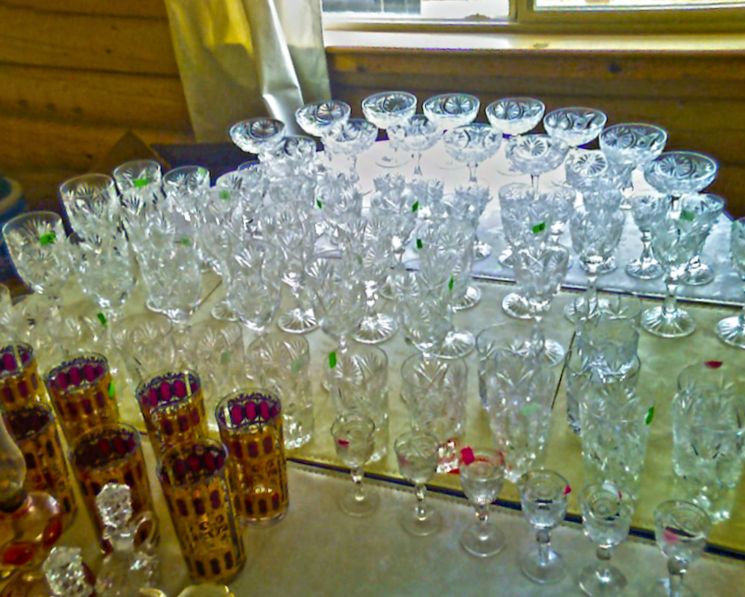 photo with a large number of cut glass pieces on it lined up as they are unpacked