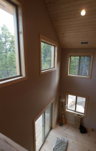 high windows vewed from a loft. 